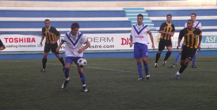 Imatge del Trofeu Vila de Gràcia del 2009 amb l'ara segon entrenador Juvenal Edjogo | Arxiu RS