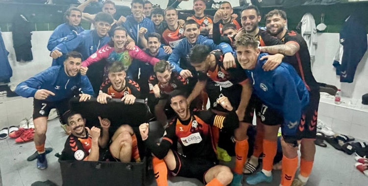 Foto de celebració després del partit