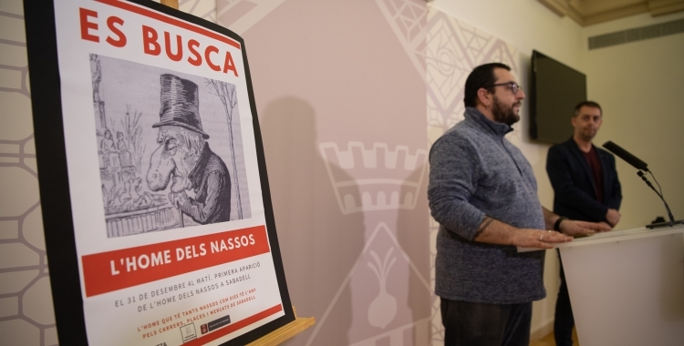 Cartell de l'Home dels Nassos, durant la presentació a la premsa/ Roger Benet