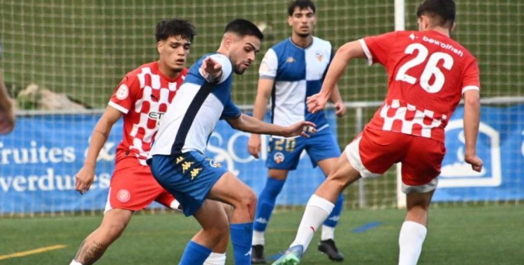 Un instant del partit entre el Centre d'Esports 'B' i el Girona 'B'