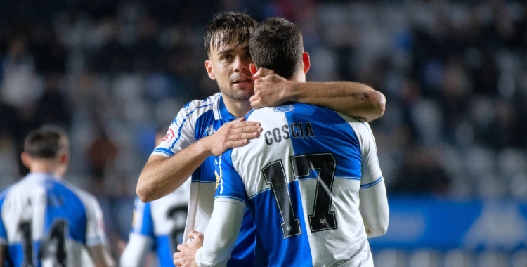 Genar abraçant Coscia | Roger Benet