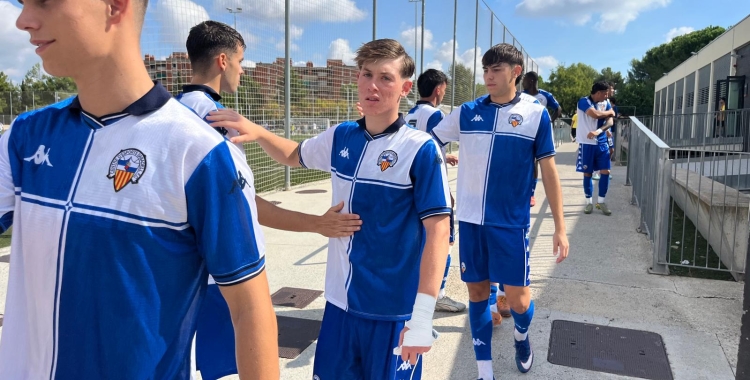 Samu Bauló, just darrere de Quim Utgés, abans del Sabadell 'B' - Manlleu | Adrián Arroyo