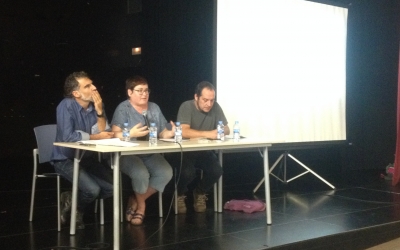Jordi Cuixart, Montserrat Mateu (Òmnium) i David Fernández durant l'acte. Foto: Ràdio Sabadell.
