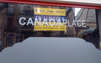 Cartell del local del Canada Place en lloguer